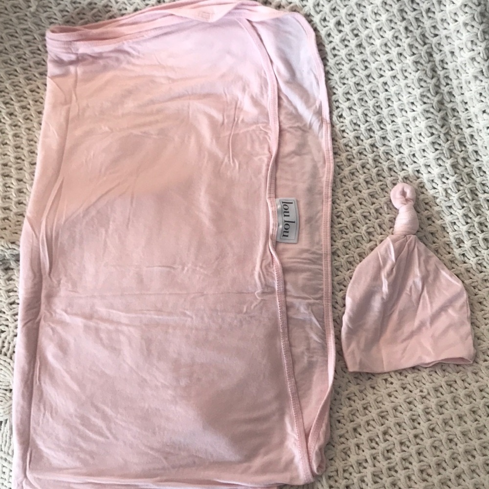 Lou Lou pink swaddle blanket and matching knot hat